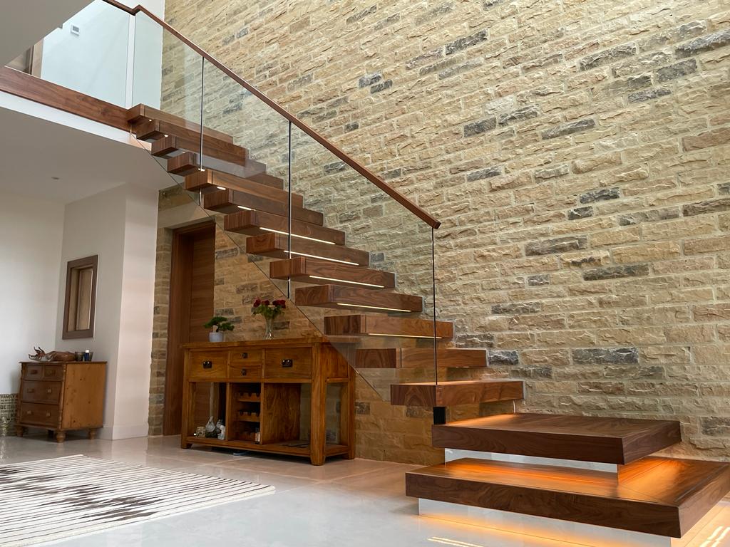 Looking for modern staircase ideas? How about this spectacular walnut floating stair.